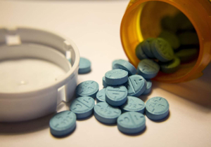 Adderall pills and bottle