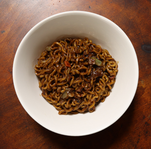 Nongshim Chapagetti noodles in a white bowl.
