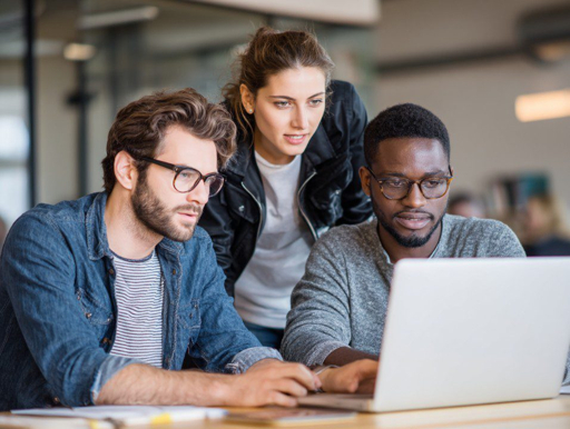 Team reviewing AI referral data together