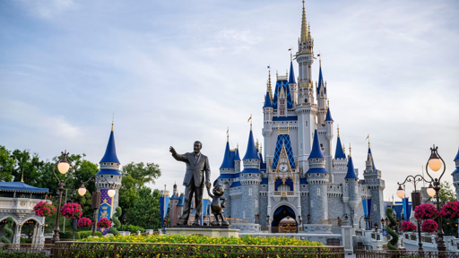 Cinderella Castle with the Walt Disney and Mickey Mouse statue at Magic Kingdom