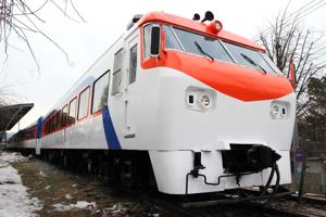Red and white diesel train