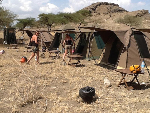 Budget safari camp with tents in the Serengeti, Tanzania