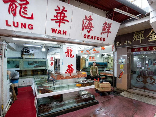 Live seafood tanks outside a restaurant in Lei Yue Mun fishing village, Hong Kong