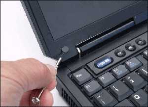 Removing screws from laptop screen bezel