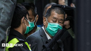 Hong Kong court jails pro-democracy media tycoon Jimmy Lai for 20 ...