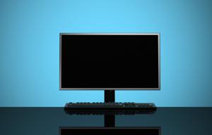 Desktop PC troubleshooting setup with monitor showing no signal