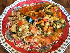 Vibrant Moroccan couscous platter with mixed vegetables and chickpeas