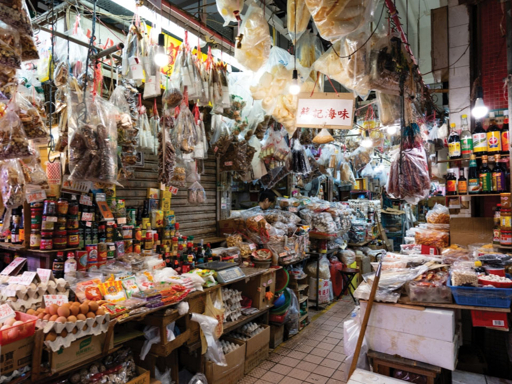 Dried seafood and fresh produce stalls inside Kowloon City wet market, Hong Kong