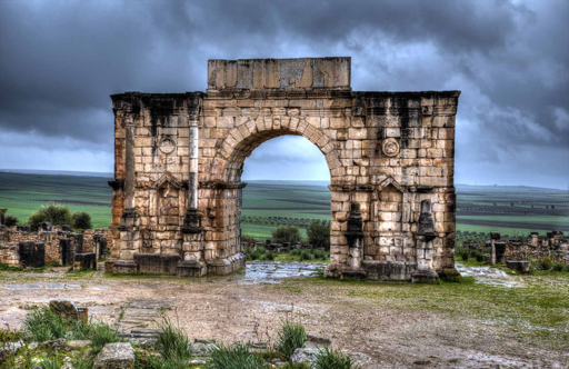Ancient Roman ruins and Arch of Caracalla at Volubilis near Fes Morocco