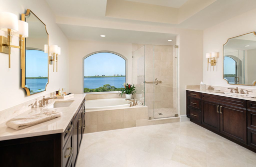 Elegant bathroom with dark wood vanity and glass shower